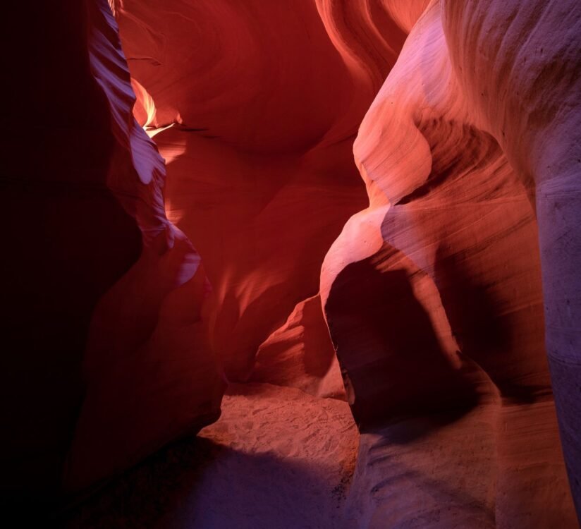 A Scenic View Of The Path In Antelope Canyon X, Arizona, Highlighting The Unique Shapes And Warm Hues Of The Sandstone Walls