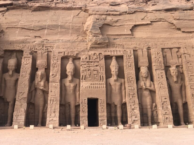 Entrance To Abu Simbel Temple In Egypt, Featuring The Small Temple Of Queen Nefertari With Grand Stone Carvings
