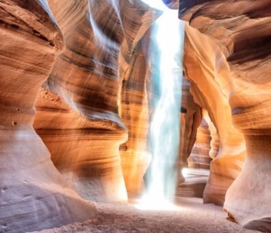 United states lower antelope canyon, arizona, displaying intricate rock formations and shafts of light filtering through the narrow canyon tour navajo guided experience, photography tips, what to expect