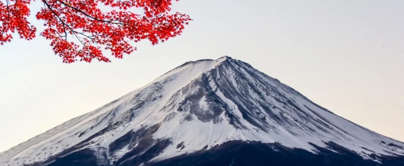 Japan mount fuji surrounded by vibrant autumn colors, showcasing japan's natural beauty during the fall season 22 best things to do in unique cultural and fun activities for first-time visitors