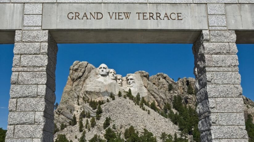 Scenic View From The Grand View Terrace In Mount Rushmore National Park, Featuring The Famous Presidential Faces Carved In Stone