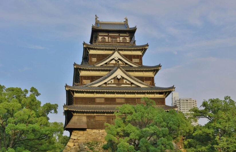 Traditional Japanese Pagoda Located In A Park, Representing Historical Architecture Amidst Lush Surroundings